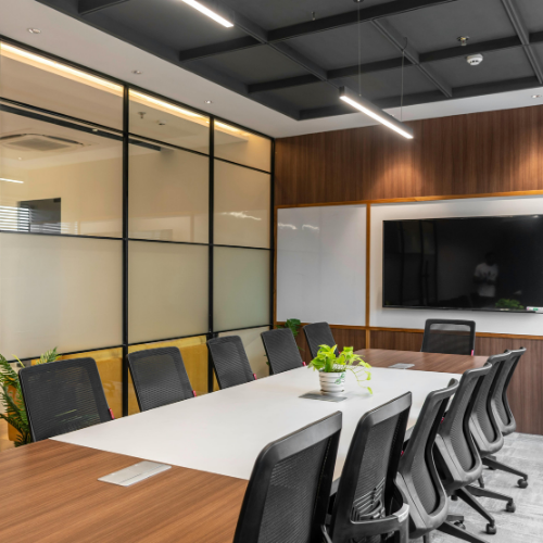 Empty meeting room with black office chairs 